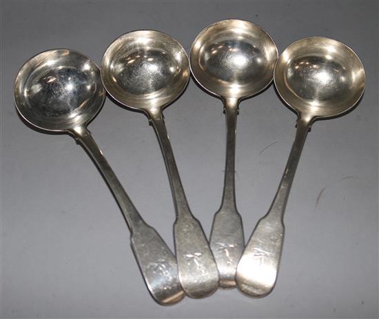 A set of four George III silver fiddle pattern sauce ladles by William Chawner II, 8 oz.